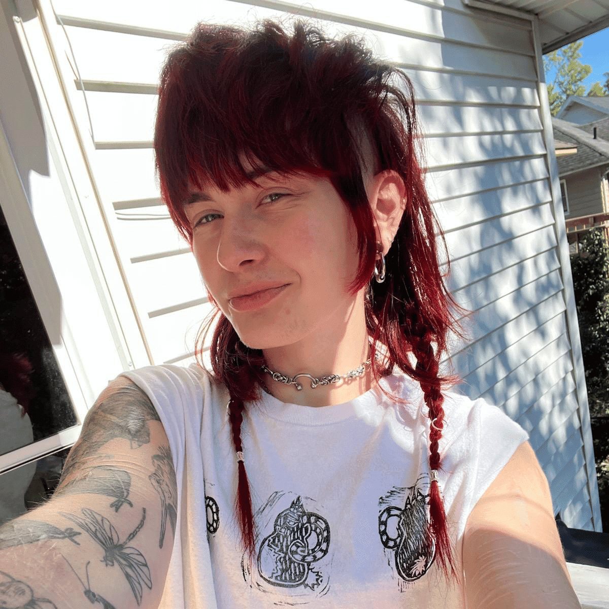 Portrait of Kace, a professional stylist at Cilantro Hair Spa, LLC, showcasing their expertise and style.