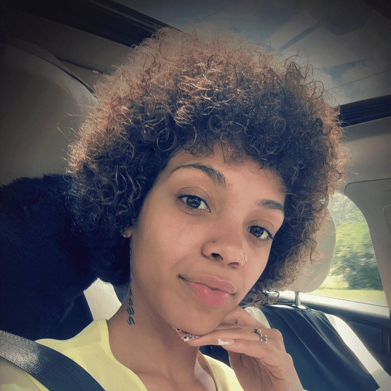 Portrait of Nevaeh, a professional stylist at Cilantro Hair Spa, LLC, showcasing their expertise and style.