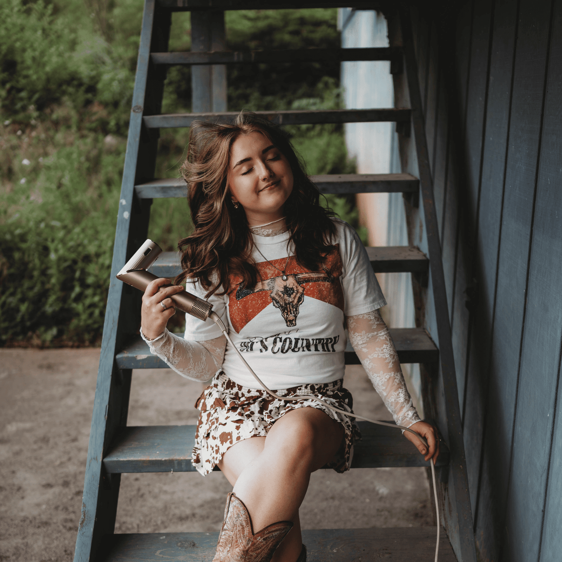 Portrait of Ariel, a professional stylist at Cilantro Hair Spa, LLC, showcasing their expertise and style.